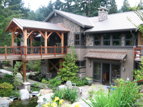 Classic Timberframe On Red Brick Road. Timberwork by Kettle River Timberworks.